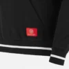 Sudadera con capucha cepillada negra de la colección Unibo para adultos Sudadera con capucha cepillada negra de la colección Unibo para adultos